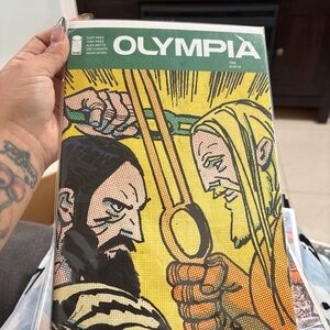 Olympia Comic Book with Vibrant Cover Art